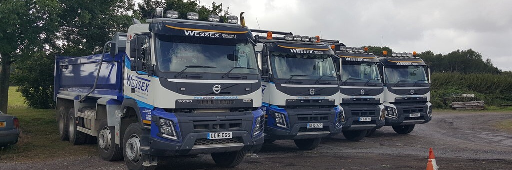 Wessex Demolition lorry fleet parked up at the aggregates yard in Southampton, Hampshire