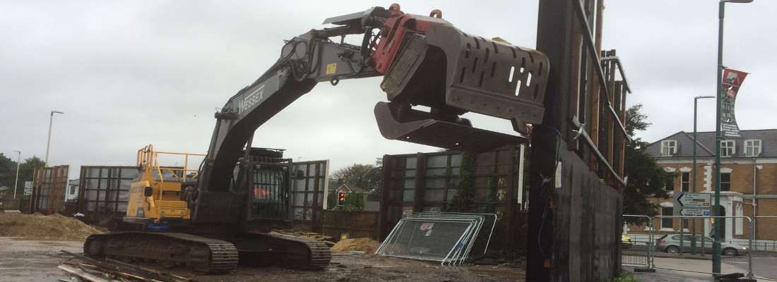 Demolition works by Volvo EC250EL