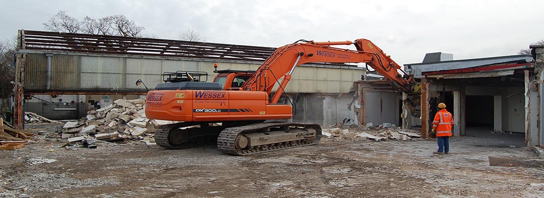 Doosan DX300 excavator in dismantling process at site in Hythe, Hampshire