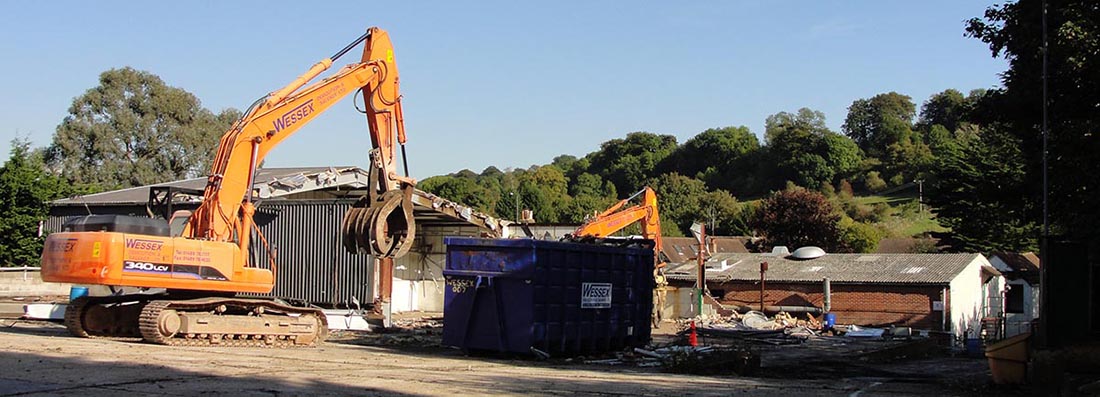 Wessex Demoltion Low Loader delivering High Reach Arm