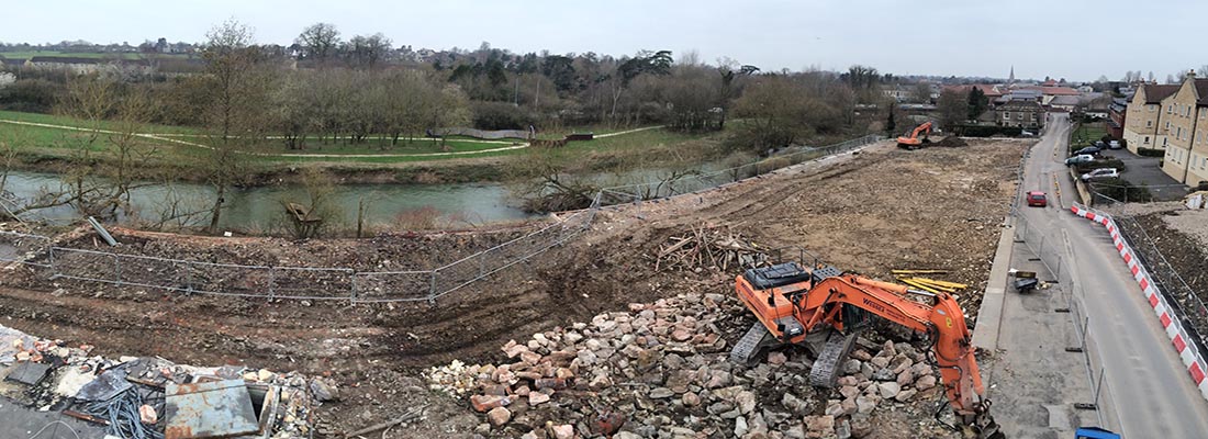 Doosan DX340 Excavator in process of site clearance works in Chippenham, Wiltshire
